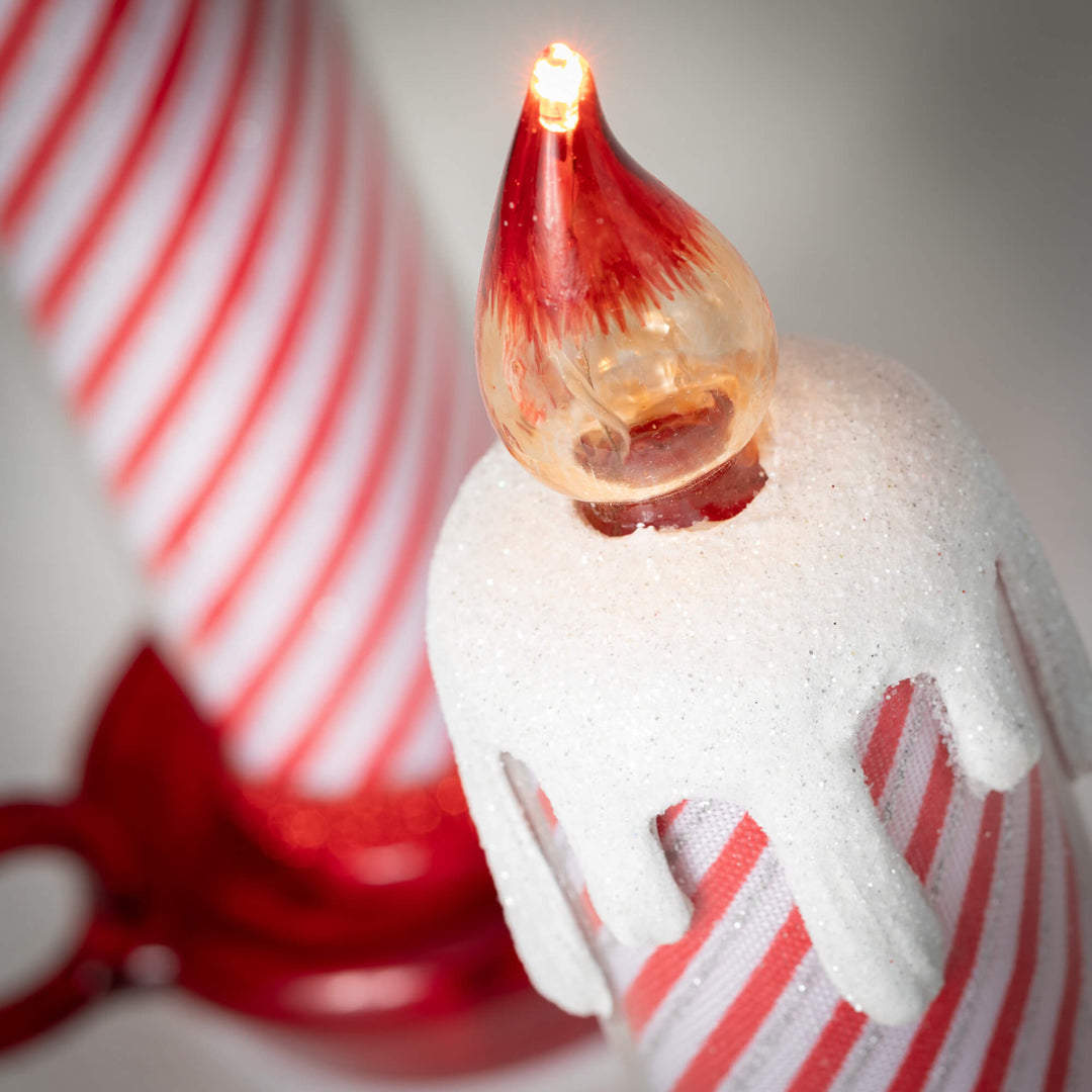 Lighted Red and White Candlesticks